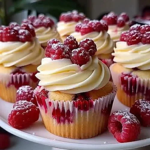 Almond Wedding Cake Cupcakes with Raspberry Filling