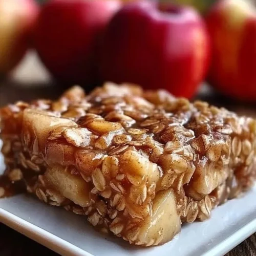 Delicious apple cinnamon baked oatmeal in a baking dish, ready to serve.