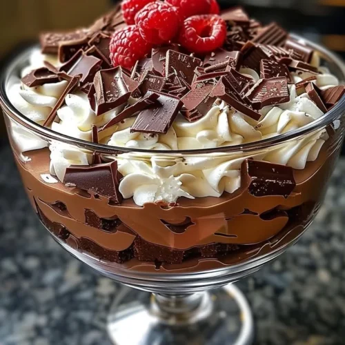 Baileys chocolate cheesecake trifle with layers of chocolate and creamy cheesecake