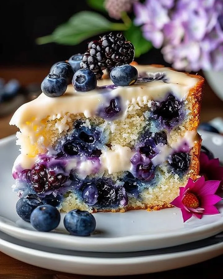 Delicious blueberry cream cheese coffee cake with fresh blueberries and cream cheese icing