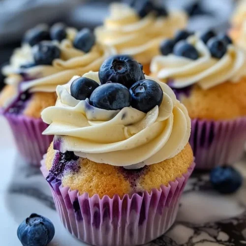 Delicious blueberry white chocolate cupcakes with frosting