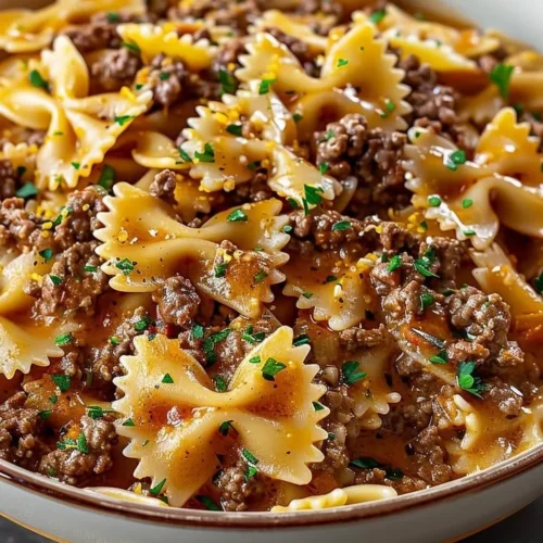 Bowtie pasta with ground beef served in a flavorful sauce