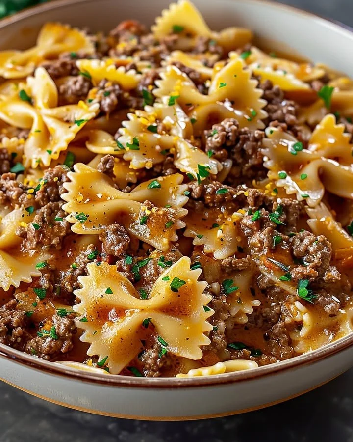 Bowtie pasta with ground beef served in a flavorful sauce