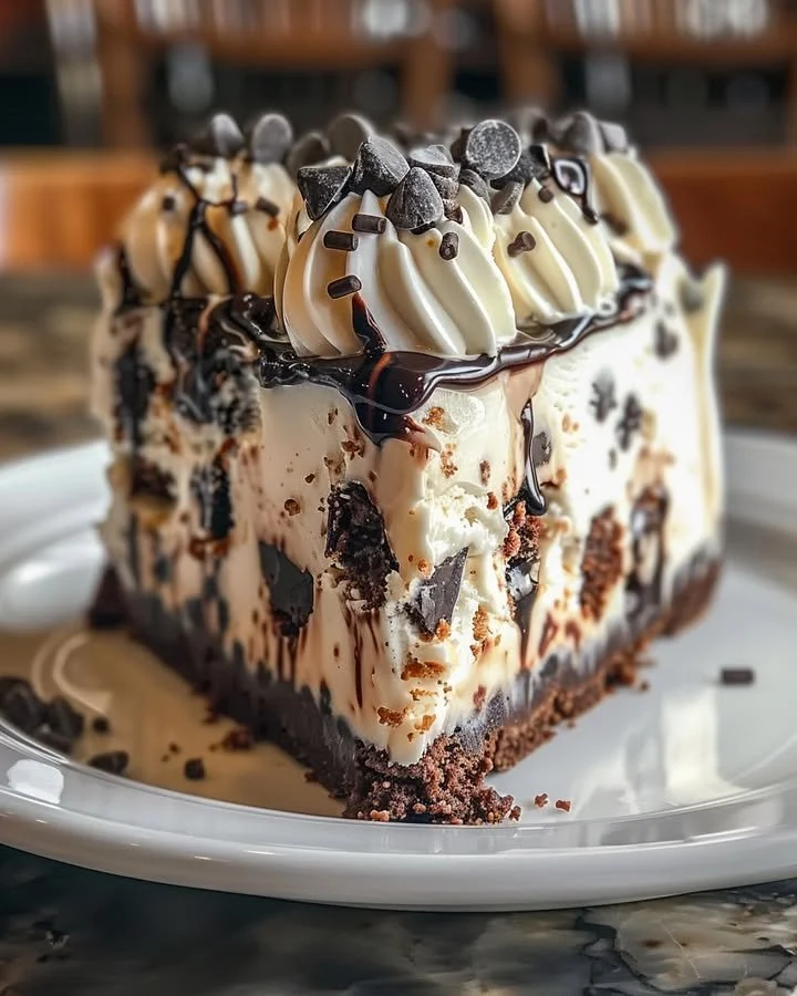 Chocolate chip cookie dough ice cream cake with layers of creamy goodness