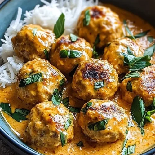 Deliciously cooked Coconut Chicken Meatballs served on a plate