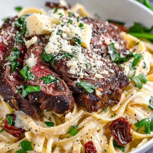 Deliciously creamy Steak Gorgonzola Alfredo served on a plate
