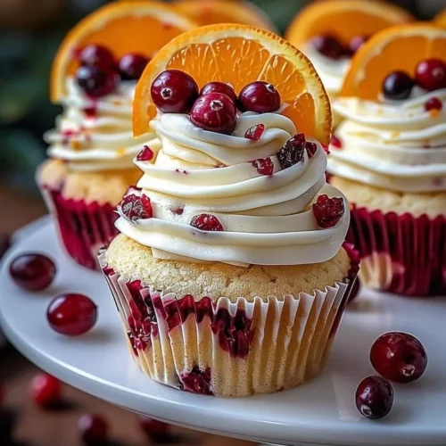 Delicious Cranberry Orange Cupcakes with white chocolate topping