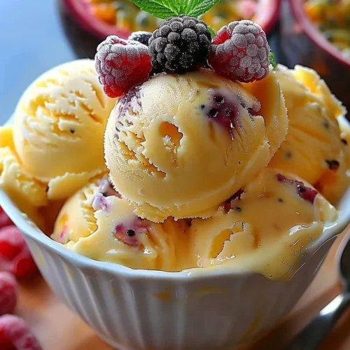 Creamy passion fruit ice cream with a tropical twist in a bowl