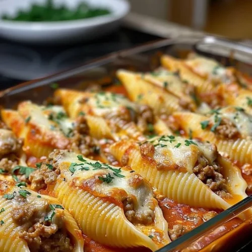 Delicious creamy ricotta beef stuffed shells pasta served on a plate