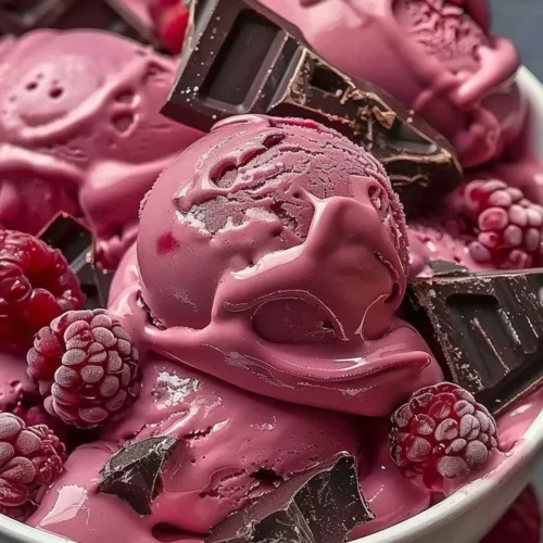 Crimson Cocoa Rhapsody Ice Cream in a bowl topped with chocolate shavings