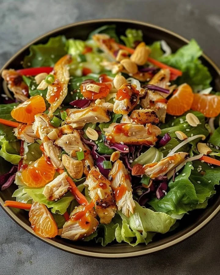 Crunchy Asian Chicken Salad with colorful vegetables and grilled chicken.