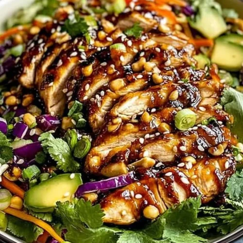 Crunchy Asian Sesame Chicken Salad with fresh vegetables and sesame dressing
