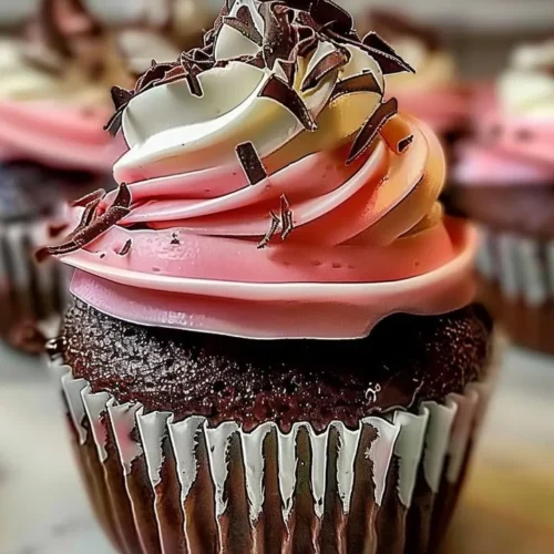 Delicious Neapolitan Cream Cupcakes with chocolate, vanilla, and strawberry layers