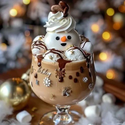 Dirty Snowman Baileys ice cream cocktail topped with whipped cream and chocolate drizzle.