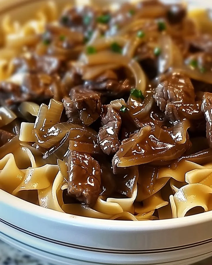 Delicious French Onion Beef and Noodles in a flavorful broth
