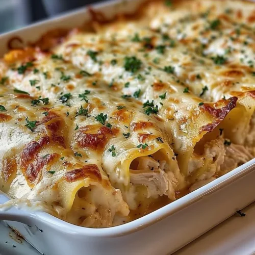 Garlic Parmesan Chicken Lasagna Roll-Ups ready to serve on a plate
