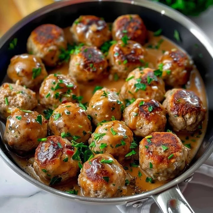 Delicious Swedish meatballs in a creamy sauce served on a plate