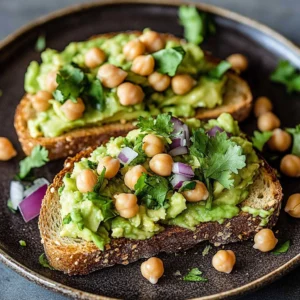 High protein vegan avocado toast topped with seeds and spices