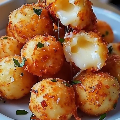 Plate of homemade fried cheese bites ready to eat