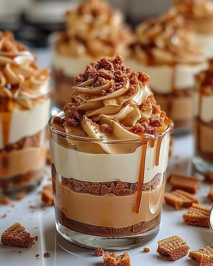 Indulgent Biscoff cheesecake cups with crunchy toppings served in dessert cups