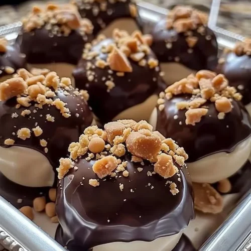 No-bake peanut butter cheesecake balls on a white plate