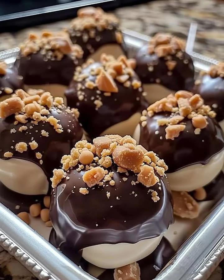 No-bake peanut butter cheesecake balls on a white plate