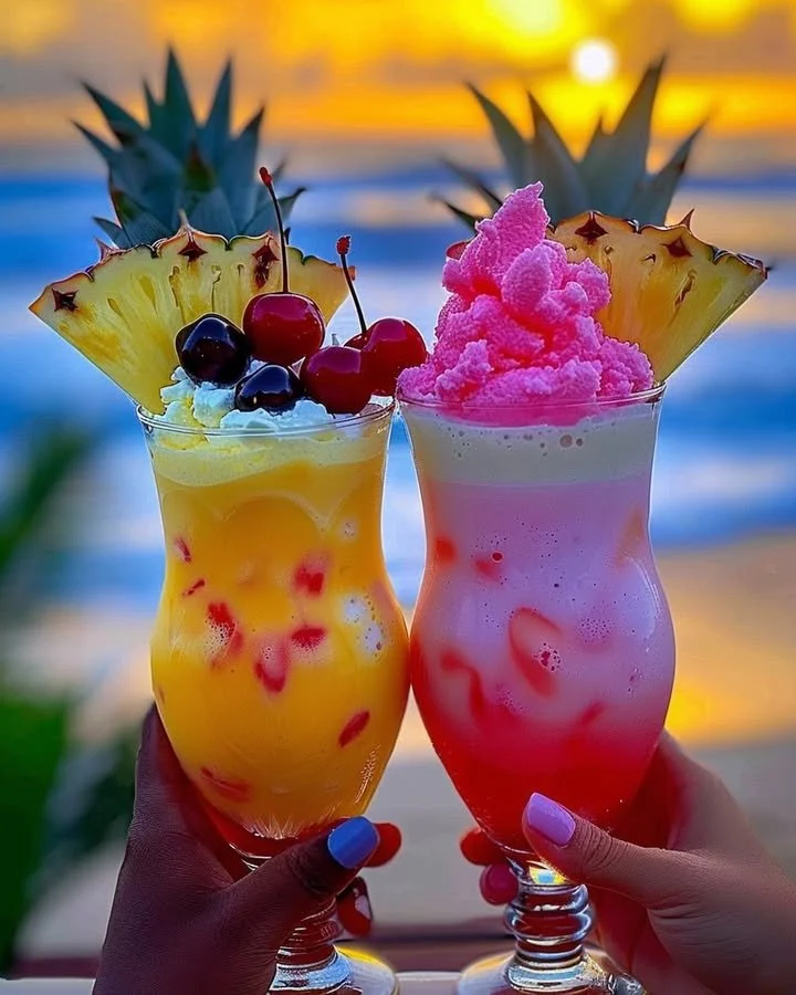 Colorful Rainbow Sherbet Piña Colada in a glass with tropical garnishes
