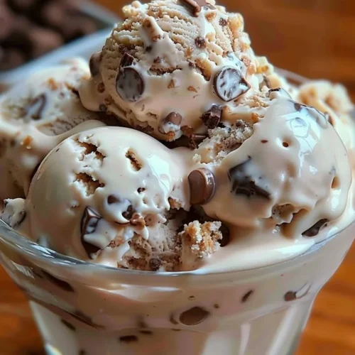 Delicious bowl of Rocky Road Ice Cream with chocolate, marshmallows, and nuts