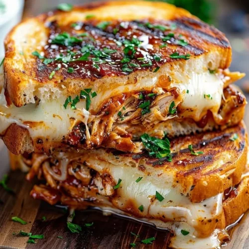 Delicious Smoky BBQ Chicken Meltdown served on a grill platter