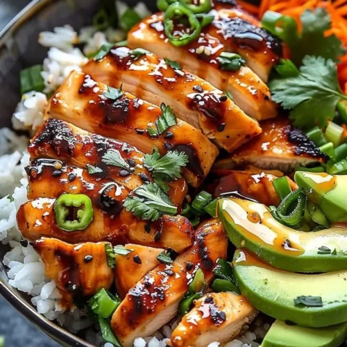 Spicy Honey Ginger Chicken Bowls with vibrant vegetables and rice
